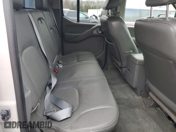 2014 Nissan Frontier SL z VIN 1N6AD0FV2EN720242, wystawiony jako Copart lot #86976214 z przebiegiem 118 581 mil mil oraz Szkoda całkowita • Salvage title. Historia ofert i sprzedaży dostępna na DreamBid. Obrazek 10.