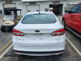 2017 Ford Fusion SE z VIN 3FA6P0H73HR319658, wystawiony jako IAAI lot #42806844 z przebiegiem 76 939 mil mil oraz . Historia ofert i sprzedaży dostępna na DreamBid. Obrazek 13.