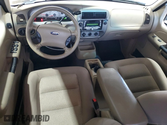 2004 Ford Explorer Sport Trac XLS with VIN 1FMZU77K74UB23543, listed as a Copart auction lot 62859625 with 96,873 mi miles and Salvage title. Bid and sale history available at DreamBid. Image 8.