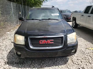 2004 GMC Envoy SLT with VIN 1GKDT13S042281050, listed as a Copart auction lot 60024304 with 267,205 mi miles and Salvage Title. Bid and sale history available at carsss.com. Image 5.