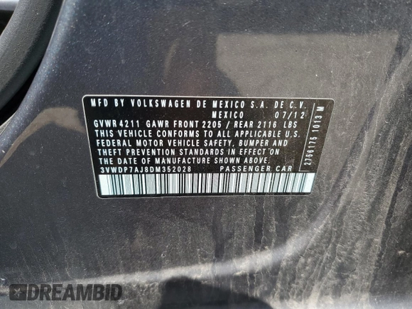 2013 Volkswagen Jetta SE z VIN 3VWDP7AJ8DM352028, wystawiony jako Copart lot #53182505 z przebiegiem 226 944 mil mil oraz Czysty tytuł • Clean title. Historia ofert i sprzedaży dostępna na DreamBid. Obrazek 12.