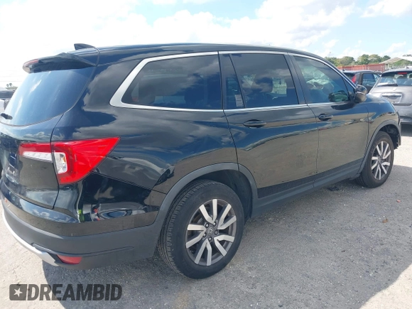 2020 Honda Pilot EX-L with VIN 5FNYF5H59LB014225, listed as a IAAI auction lot 41689776 with 90,994 mi miles. Bid and sale history available at carsss.com. Image 4.