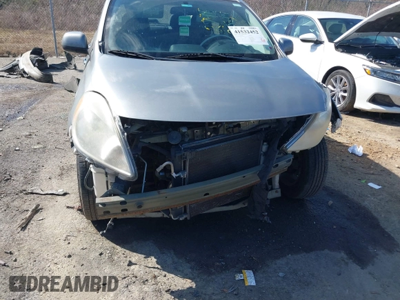 2012 Nissan Versa SL with VIN 3N1CN7AP6CL932748, listed as a IAAI auction lot 41532452 with 110,881 mi miles. Bid and sale history available at carsss.com. Image 6.