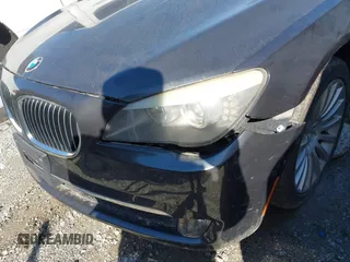 2012 BMW 7 Series 750Li xDrive with VIN WBAKC8C55CC436123, listed as a IAAI auction lot 41779443 with 126,618 mi miles and . Bid and sale history available at DreamBid. Image 13.