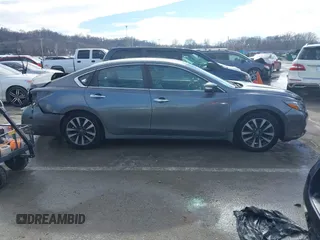 2016 Nissan Altima S z VIN 1N4AL3AP5GC221181, wystawiony jako IAAI lot #41341404 z przebiegiem 177 674 mil mil oraz . Historia ofert i sprzedaży dostępna na DreamBid. Obrazek 13.