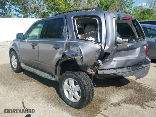 2008 Ford Escape XLT with VIN 1FMCU031X8KA77833, listed as a Copart auction lot 52677714 with 218,934 mi miles and Non Repairable. Bid and sale history available at carsss.com. Image 2.