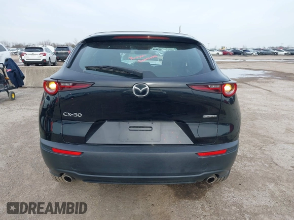 2021 Mazda CX-30 2.5 S with VIN 3MVDMAAL2MM303321, listed as a IAAI auction lot 41583346 with 57,122 mi miles. Bid and sale history available at carsss.com. Image 16.