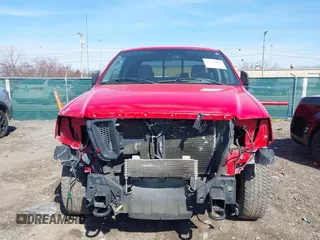 2005 Ford F-150 STX with VIN 1FTRX14W25NA45992, listed as a IAAI auction lot 41702409 with 202,867 mi miles. Bid and sale history available at carsss.com. Image 6.