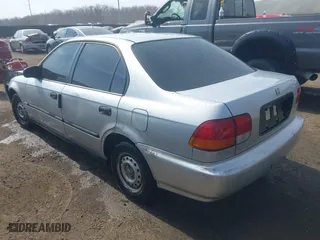1996 Honda Civic DX with VIN 2HGEJ6627TH550103, listed as a IAAI auction lot 41710877 with 142,608 mi miles. Bid and sale history available at carsss.com. Image 3.
