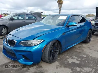 2017 BMW M2 z VIN WBS1H9C53HV887089, wystawiony jako IAAI lot #41731841 z przebiegiem 57 509 mil mil oraz . Historia ofert i sprzedaży dostępna na DreamBid. Obrazek 2.