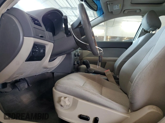 2012 Ford Fusion SE with VIN 3FAHP0HA5CR427017, listed as a Copart auction lot 64191425 with 211,924 mi miles and Salvage title. Bid and sale history available at DreamBid. Image 7.