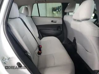 2023 Toyota Corolla Cross L z VIN 7MUAAAAG7PV053889, wystawiony jako Copart lot #61677525 z przebiegiem 27 970 mil mil oraz Szkoda całkowita • Salvage title. Historia ofert i sprzedaży dostępna na DreamBid. Obrazek 11.