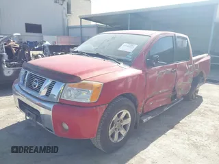 2011 Nissan Titan SV with VIN 1N6BA0ED0BN308385, listed as a IAAI auction lot 41681034 with 184,681 mi miles and . Bid and sale history available at DreamBid. Image 2.