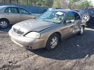2004 Mercury Sable GS with VIN 1MEFM50U44G608274, listed as a IAAI auction lot 42064275 with 163,420 mi miles. Bid and sale history available at carsss.com. Image 2.
