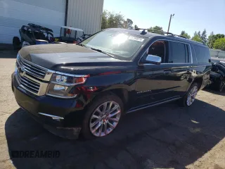 2019 Chevrolet Suburban Premier with VIN 1GNSKJKJ1KR151983, listed as a Copart auction lot 68709074 with 86,611 mi miles and Salvage Title. Bid and sale history available at DreamBid. Image 1.