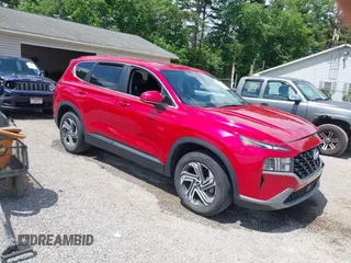 2021 Hyundai Santa Fe SE z VIN 5NMS14AJXMH336085, wystawiony jako IAAI lot #42301440 z przebiegiem 23 612 mil mil oraz . Historia ofert i sprzedaży dostępna na DreamBid. Obrazek 1.