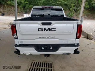 2023 GMC Sierra 1500 Denali Ultimate with VIN 1GTUUHEL0PZ318889, listed as a Copart auction lot 71713984 with 8,986 mi miles and Salvage Title. Bid and sale history available at carsss.com. Image 6.