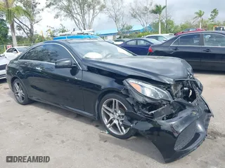 2017 Mercedes-Benz E-Class E 400 with VIN WDDKJ6HBXHF353634, listed as a IAAI auction lot 41203314 with 106,531 mi miles. Bid and sale history available at carsss.com. Image 1.