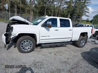 2019 GMC Sierra 2500HD Denali z VIN 1GT12SEY3KF269442, wystawiony jako IAAI lot #42231991 z przebiegiem 75 172 mil mil oraz . Historia ofert i sprzedaży dostępna na DreamBid. Obrazek 15.