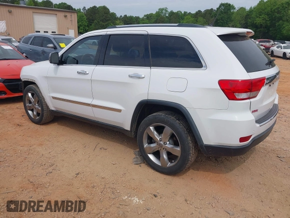 2013 Jeep Grand Cherokee Overland with VIN 1C4RJECGXDC621227, listed as a IAAI auction lot 42098042 with 194,232 mi miles and . Bid and sale history available at DreamBid. Image 3.
