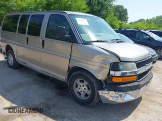 2004 Chevrolet Express Passenger z VIN 1GBFG15T041157045, wystawiony jako IAAI lot #42486752 z przebiegiem 319 752 mil mil oraz . Historia ofert i sprzedaży dostępna na DreamBid. Obrazek 1.