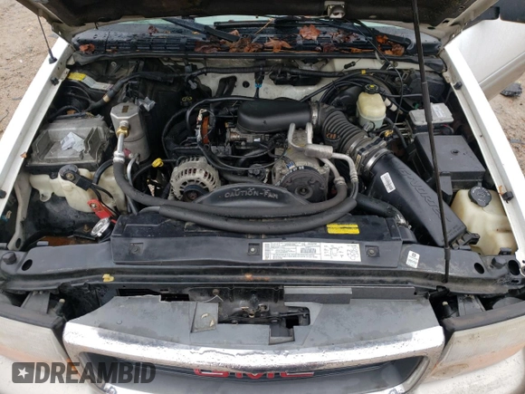 2001 GMC Jimmy SLT with VIN 1GKDT13W712155718, listed as a Copart auction lot 80688554 with 114,116 mi miles and Salvage Title. Bid and sale history available at carsss.com. Image 13.