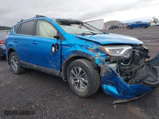 2016 Toyota RAV4 Hybrid XLE with VIN JTMRJREVXGD043129, listed as a IAAI auction lot 41786071 with 97,919 mi miles. Bid and sale history available at carsss.com. Image 1.
