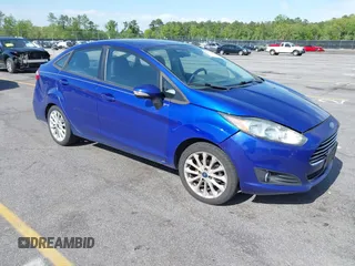 2014 Ford Fiesta SE with VIN 3FADP4BJ5EM190009, listed as a IAAI auction lot 42036976 with 157,575 mi miles. Bid and sale history available at carsss.com. Image 1.