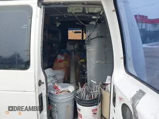 2004 Ford Econoline Cargo z VIN 1FTNE24L04HB05474, wystawiony jako IAAI lot #41320247 z przebiegiem 153 216 mil mil oraz . Historia ofert i sprzedaży dostępna na DreamBid. Obrazek 8.