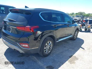 2019 Hyundai Santa Fe SEL with VIN 5NMS33AD4KH046114, listed as a IAAI auction lot 41826467 with 102,714 mi miles and . Bid and sale history available at DreamBid. Image 4.