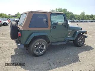 1999 Jeep Wrangler Sahara z VIN 1J4FY49S0XP453920, wystawiony jako Copart lot #61808475 z przebiegiem 129 062 mil mil oraz Czysty tytuł • Clean title. Historia ofert i sprzedaży dostępna na DreamBid. Obrazek 3.