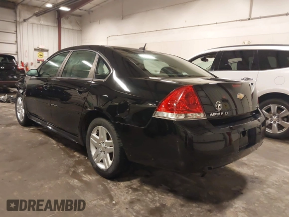 2014 Chevrolet Impala LT with VIN 2G1WB5E32E1127731, listed as a IAAI auction lot 42018987 with 163,649 mi miles and . Bid and sale history available at DreamBid. Image 3.