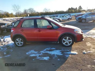 2009 Suzuki SX4 Man Touring Pkg AWD with VIN JS2YB417996202822, listed as a IAAI auction lot 41423724 with 181,531 mi miles. Bid and sale history available at carsss.com. Image 13.