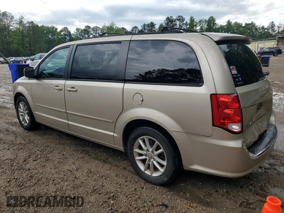 2015 Dodge Grand Caravan SXT with VIN 2C4RDGCG7FR536049, listed as a Copart auction lot 55963115 with 141,228 mi miles and Clean Title. Bid and sale history available at DreamBid. Image 2.