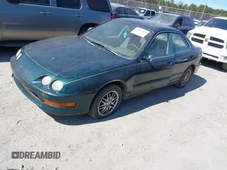 1999 Acura Integra LS with VIN JH4DB7658XS002311, listed as a IAAI auction lot 41697843 with 235,682 mi miles and . Bid and sale history available at DreamBid. Image 2.