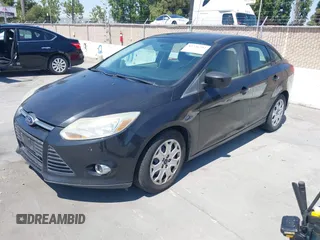 2012 Ford Focus SE with VIN 1FAHP3F24CL471005, listed as a IAAI auction lot 42726292 with 162,750 mi miles and . Bid and sale history available at DreamBid. Image 2.