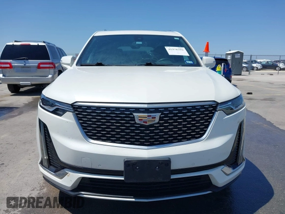 2021 Cadillac XT6 Premium Luxury with VIN 1GYKPCRS2MZ151718, listed as a IAAI auction lot 41978392 with 58,230 mi miles and . Bid and sale history available at DreamBid. Image 12.