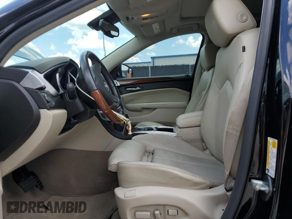 2011 Cadillac SRX Premium Collection z VIN 3GYFNCEY7BS672218, wystawiony jako Copart lot #66852915 z przebiegiem 119 917 mil mil oraz Czysty tytuł • Clean title. Historia ofert i sprzedaży dostępna na DreamBid. Obrazek 7.