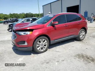 2019 Ford Edge Titanium z VIN 2FMPK3K91KBB99949, wystawiony jako Copart lot #57023225 z przebiegiem 103 876 mil mil oraz Nie do naprawy. Historia ofert i sprzedaży dostępna na DreamBid. Obrazek 1.