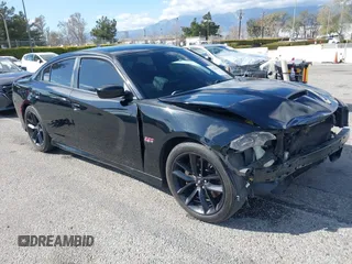 2019 Dodge Charger Scat Pack z VIN 2C3CDXGJXKH746256, wystawiony jako IAAI lot #41708108 z przebiegiem 84 412 mil mil oraz . Historia ofert i sprzedaży dostępna na DreamBid. Obrazek 1.