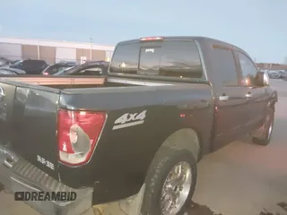 2004 Nissan Titan LE with VIN 1N6AA07B84N511373, listed as a IAAI auction lot 41200457 with 172,783 mi miles and . Bid and sale history available at DreamBid. Image 14.