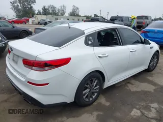 2019 Kia Optima LX with VIN 5XXGT4L36KG371801, listed as a IAAI auction lot 41885607 with 150,043 mi miles. Bid and sale history available at carsss.com. Image 4.