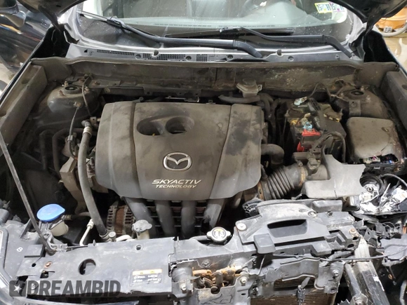 2018 Mazda CX-3 Touring z VIN JM1DKFC75J0301307, wystawiony jako Copart lot #56302175 z przebiegiem 107 676 mil mil oraz Szkoda całkowita • Salvage title. Historia ofert i sprzedaży dostępna na DreamBid. Obrazek 11.