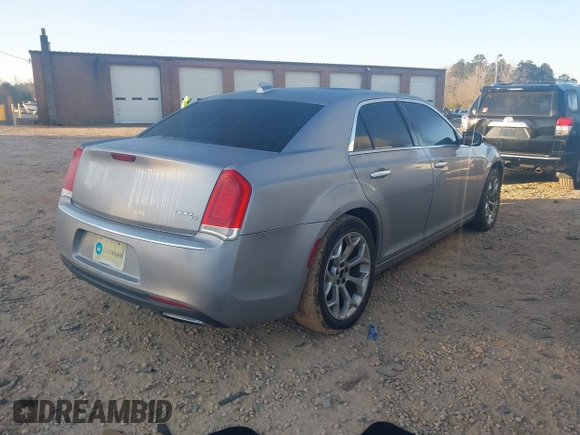 2016 Chrysler 300 with VIN 2C3CCAPG6GH167731, listed as a IAAI auction lot 41779615 with 127,679 mi miles. Bid and sale history available at carsss.com. Image 4.