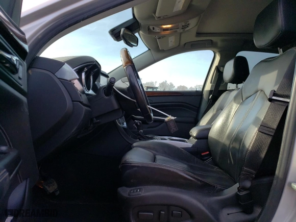 2012 Cadillac SRX Luxury Collection with VIN 3GYFNDE32CS576461, listed as a Copart auction lot 51496005 with 145,882 mi miles and Salvage Title. Bid and sale history available at carsss.com. Image 7.