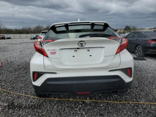 2018 Toyota C-HR XLE z VIN JTNKHMBXXJ1003871, wystawiony jako Copart lot #49984355 z przebiegiem 101 395 mil mil oraz Szkoda całkowita • Salvage title. Historia ofert i sprzedaży dostępna na DreamBid. Obrazek 6.