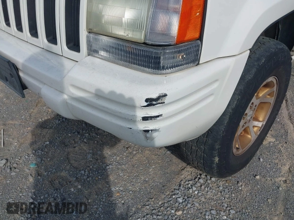 1998 Jeep Grand Cherokee Limited z VIN 1J4GZ78Y9WC342250, wystawiony jako IAAI lot #42047991 z przebiegiem 271 579 mil mil oraz . Historia ofert i sprzedaży dostępna na DreamBid. Obrazek 6.