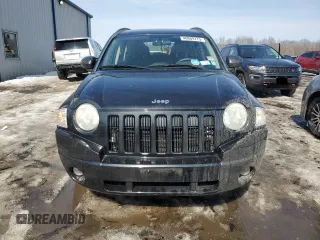 2010 Jeep Compass Sport with VIN 1J4NF4FB2AD591523, listed as a Copart auction lot 48809775 with 105,720 mi miles and Salvage Title. Bid and sale history available at carsss.com. Image 5.