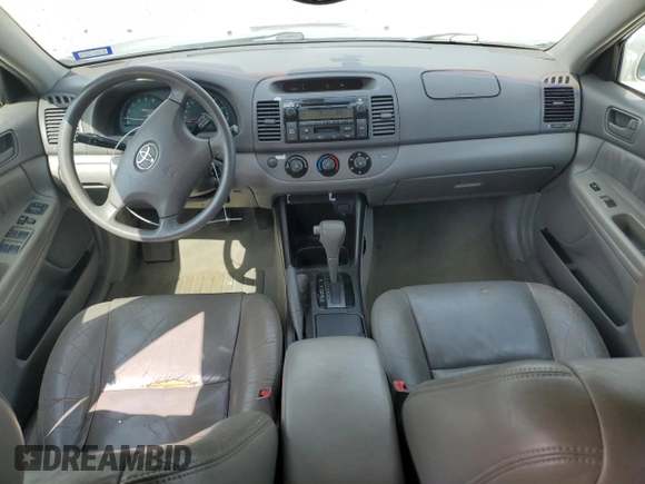 2002 Toyota Camry XLE z VIN 4T1BF32K12U519069, wystawiony jako Copart lot #55501405 z przebiegiem 186 142 mil mil oraz Szkoda całkowita • Salvage title. Historia ofert i sprzedaży dostępna na DreamBid. Obrazek 8.