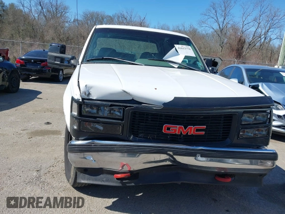 1996 GMC Sierra 1500 with VIN 1GTGC33R4TF018147, listed as a IAAI auction lot 41612770 with 106,443 mi miles and . Bid and sale history available at DreamBid. Image 6.